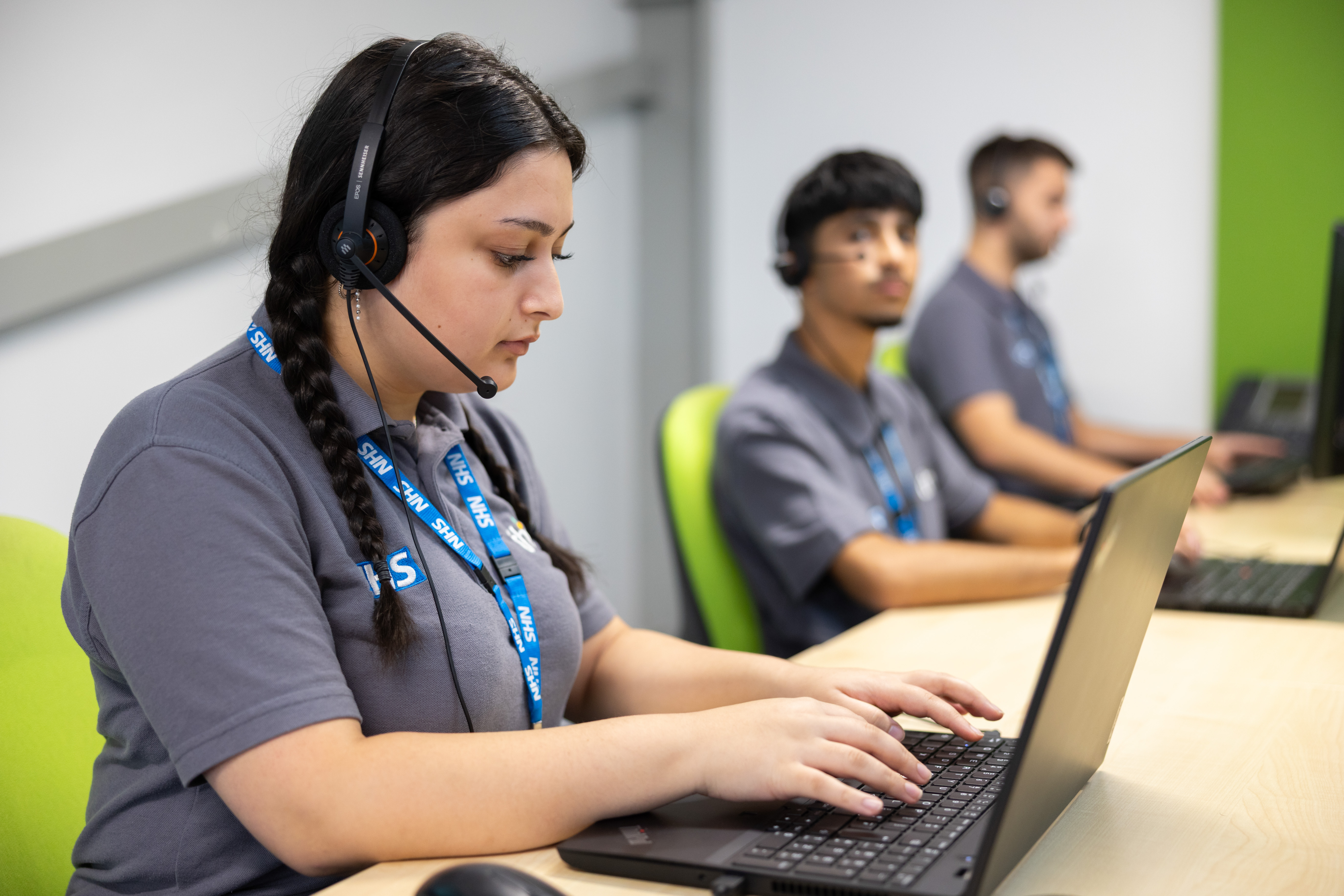 Service desk worker with headset on