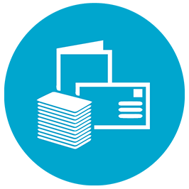 Stacked pile of business cards, booklet and envelope 