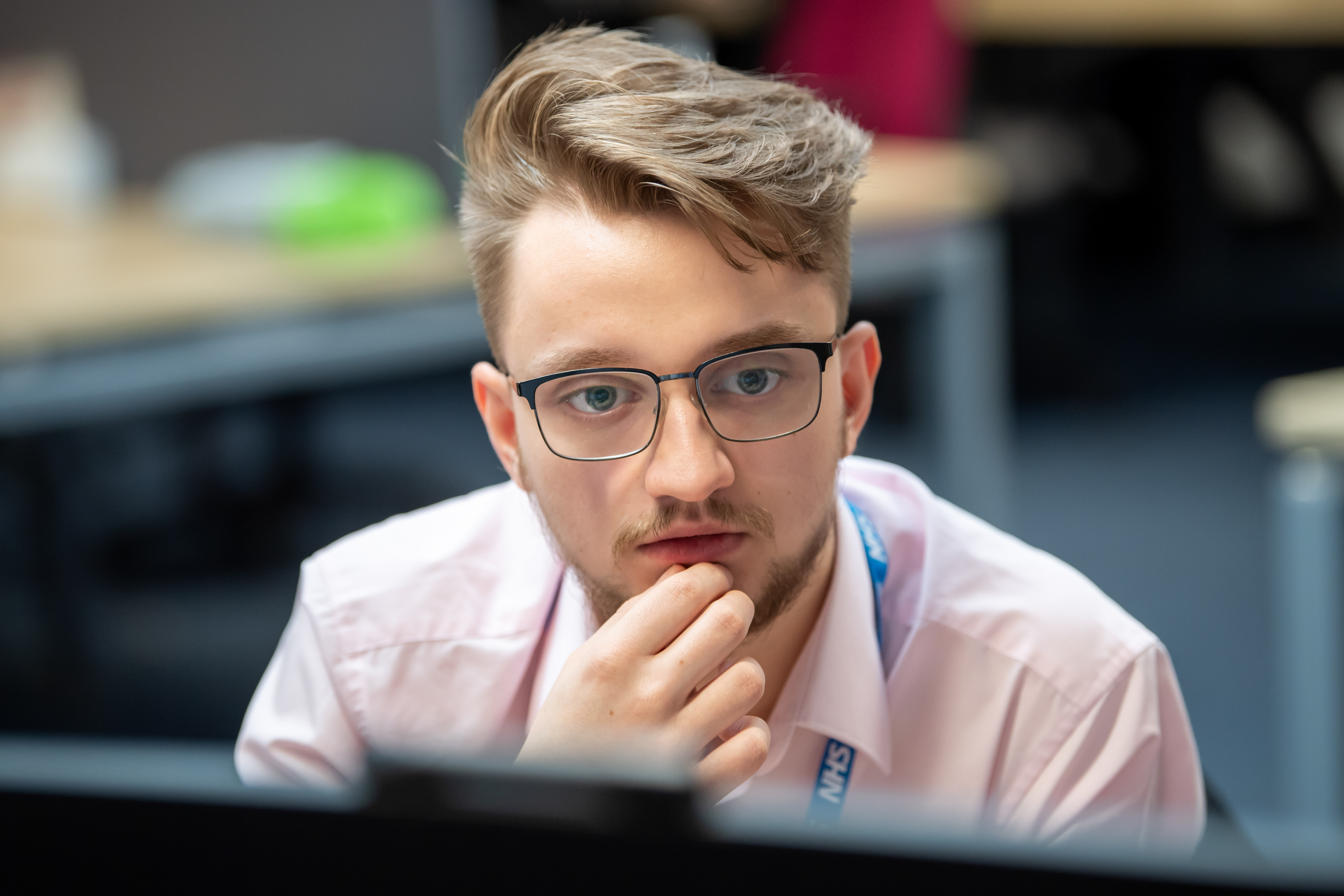 NHS staff member using a computer